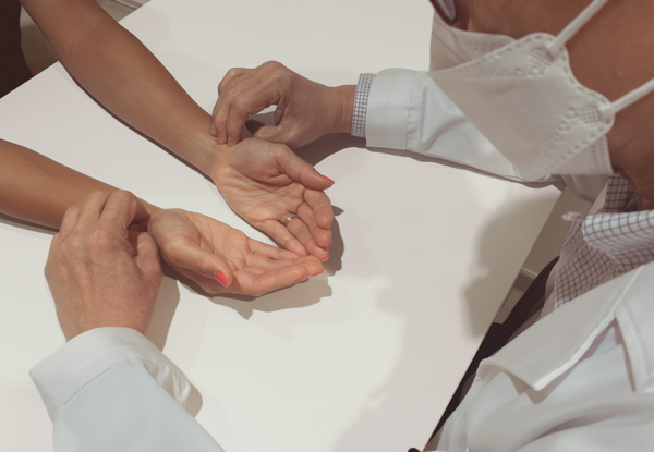 TCM physician conducted a pulse examination